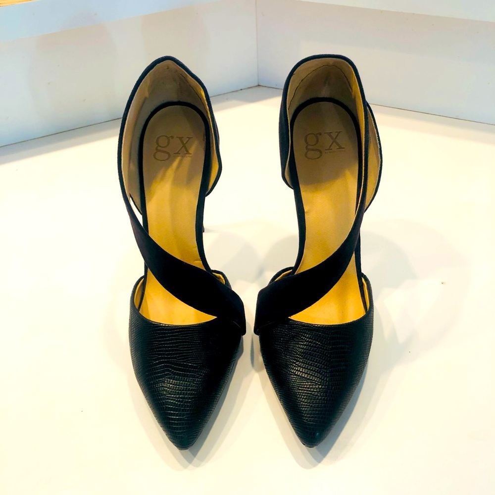 Gwen Stefani edition black spike high heel. A unique and flattering style!